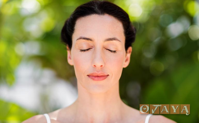 Woman meditates with no concentration for deep peace.